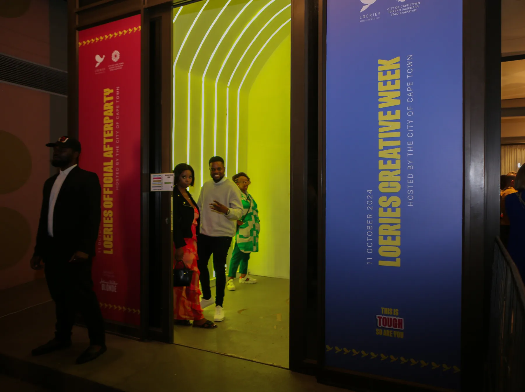 Creative Week branding at a venue entrance